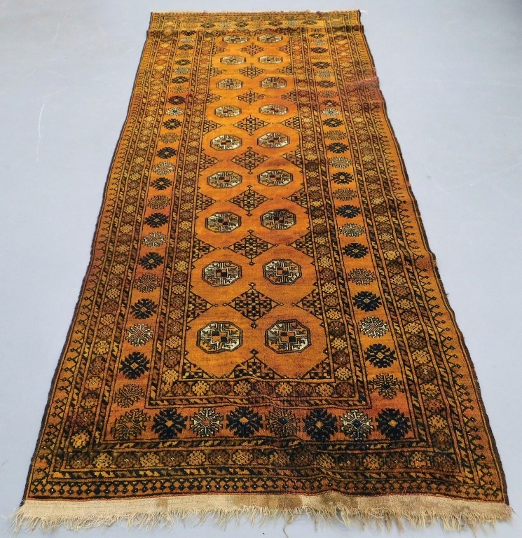 Appraisal: AFGHAN BURNT ORANGE GEOMETRIC RUNNER Middle East th Century Black