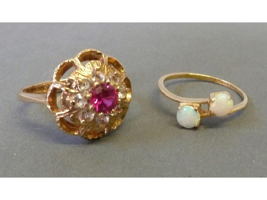 Appraisal: ct GOLD CROSSOVER RING set with two circular opals and