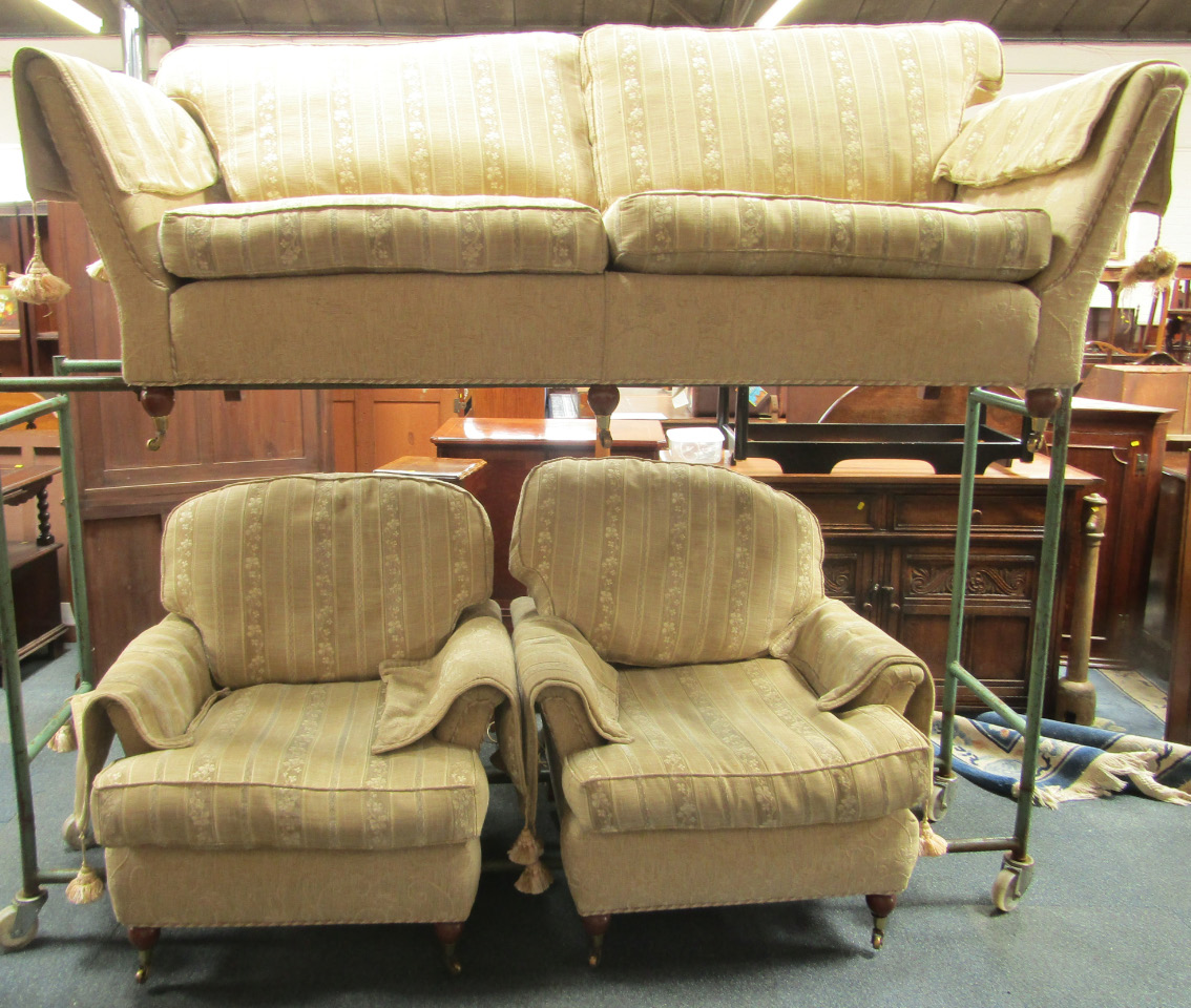 Appraisal: A Duresta three seater sofa upholstered in fawn patterned draylon