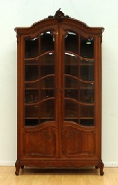 Appraisal: A French walnut bibliotheque with a pair of glazed panelled