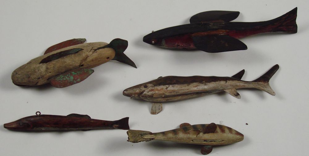 Appraisal: FIVE OLD PAINTED WOODEN FISH DECOYS Lengths to