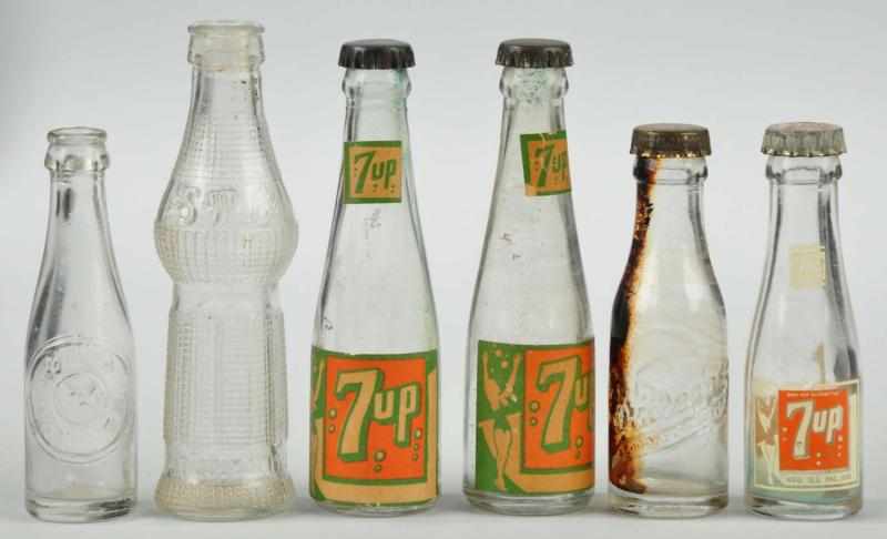 Appraisal: Small Glass Soda Bottles Description Some light soling on one