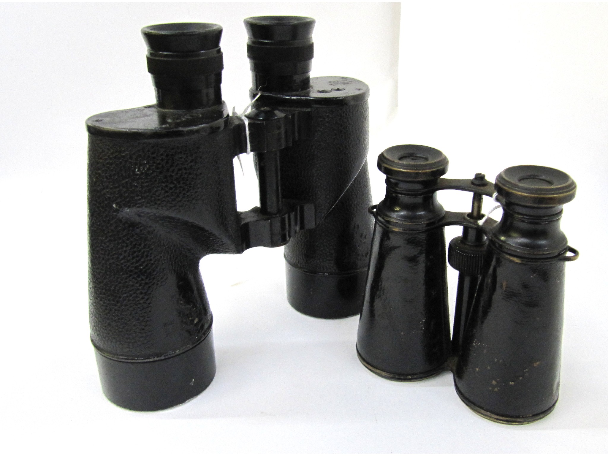 Appraisal: A lot comprising two pairs of binoculars one cased