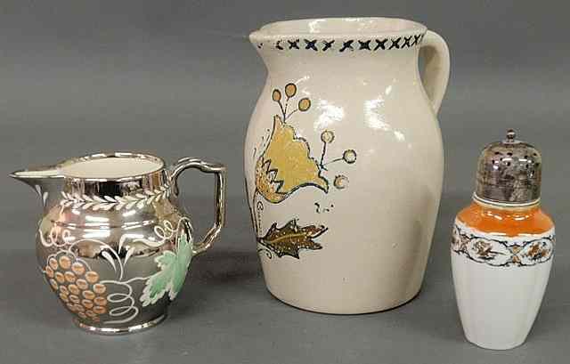 Appraisal: Earthenware pitcher th c with painted tulip h a silver