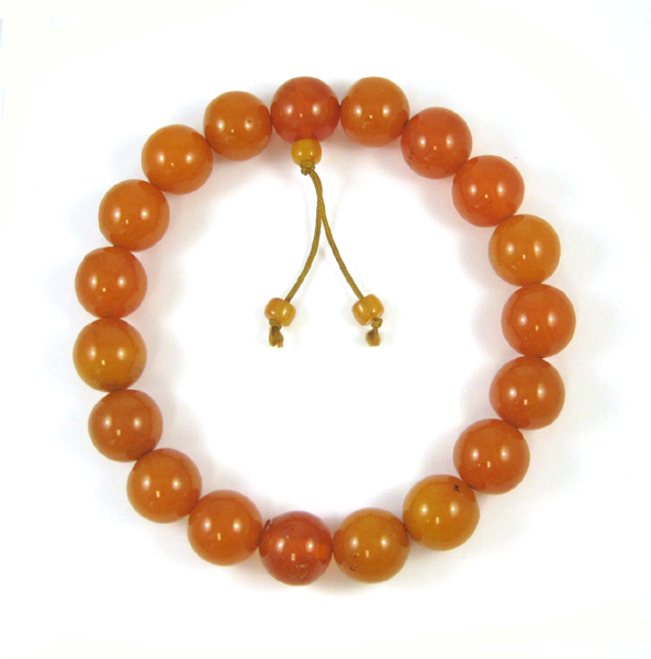 Appraisal: AMBER BEAD NECKLACE measuring approximately inches in length and strung