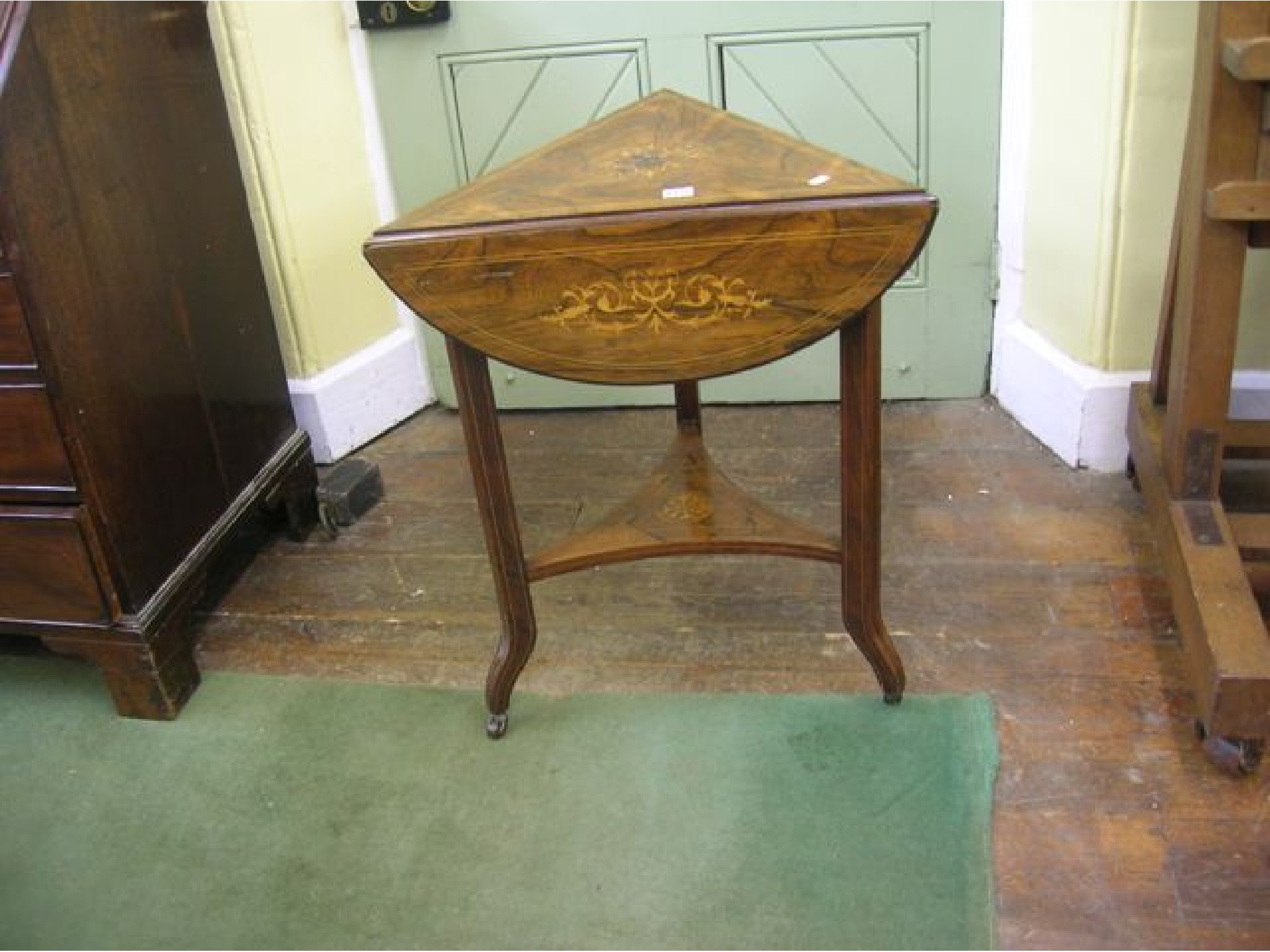 Appraisal: A late Victorian rosewood and marquetry inlaid corner envelope table