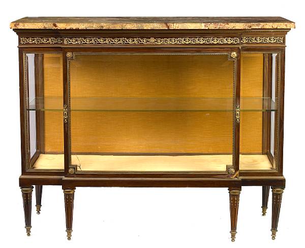 Appraisal: A Louis XV style gilt metal mounted vitrine cabinet height