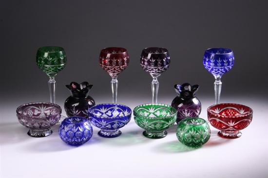 Appraisal: PIECES BOHEMIAN COLORED CUT-TO-CLEAR GLASS th century Including twelve goblets