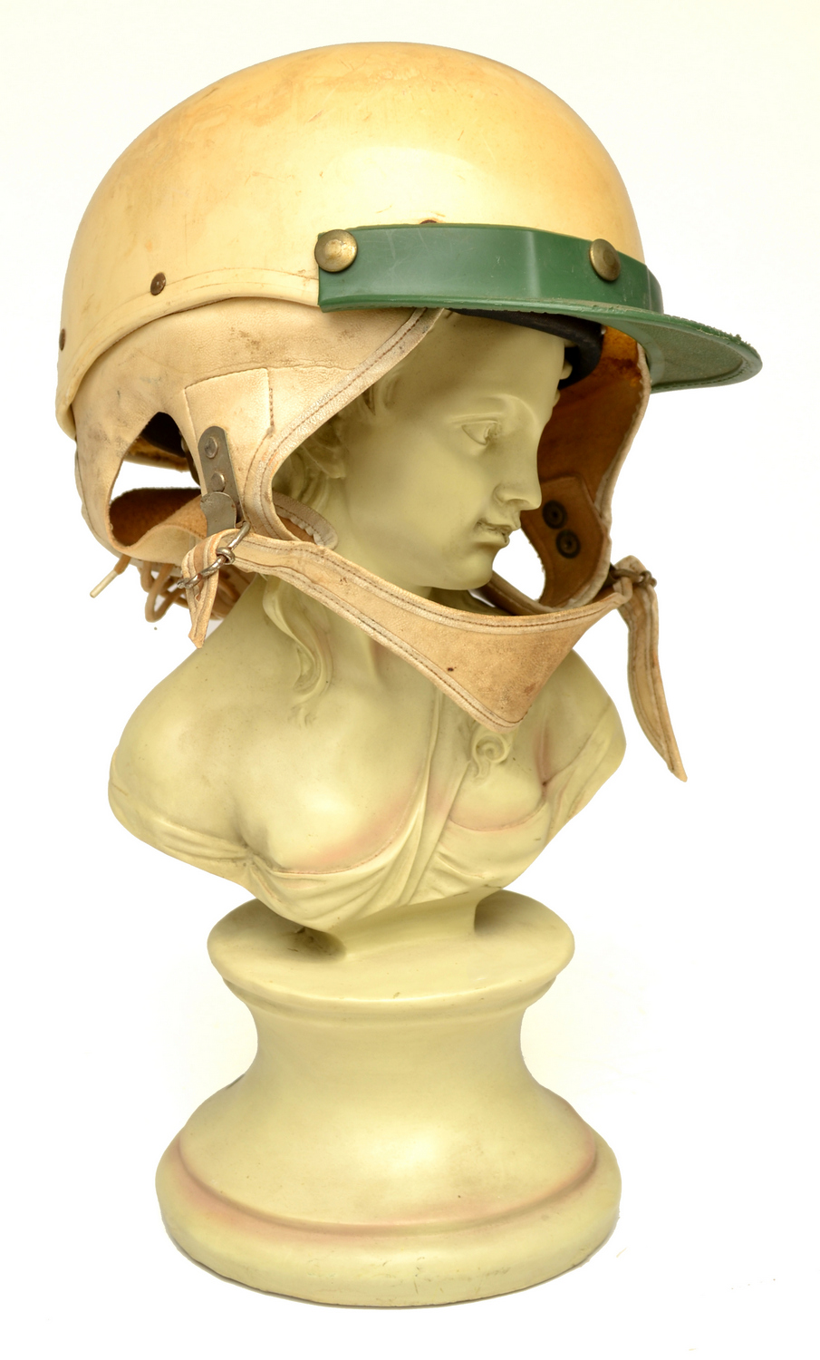 Appraisal: A CLASSICAL STYLE RESIN BUST OF A WOMAN WEARING A