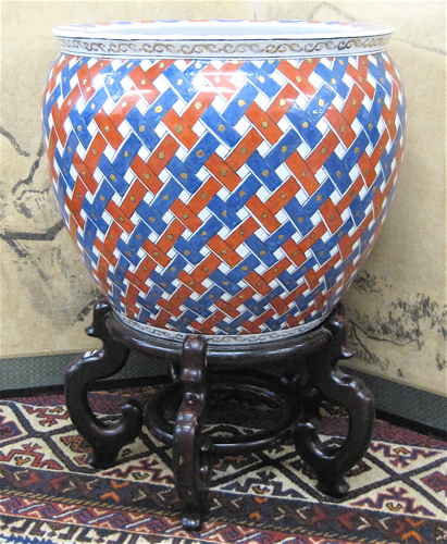 Appraisal: CHINESE PORCELAIN FISHBOWL ON WOOD FLOOR STAND the round jar