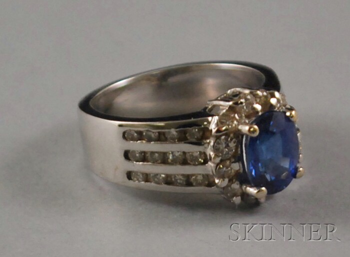 Appraisal: kt White Gold Diamond and Blue Gemstone Ring center stone