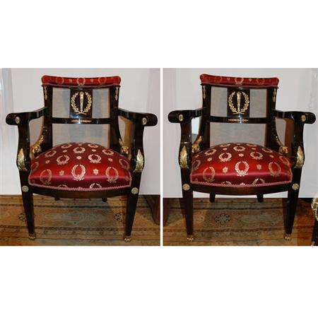 Appraisal: Set of Four Empire Style Gilt-Metal Mounted mahogany Stained Fauteuils