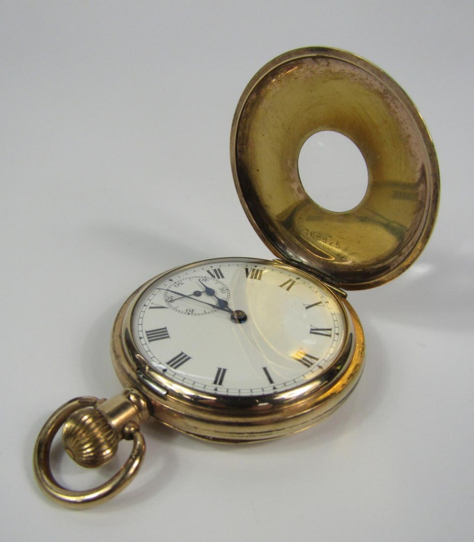 Appraisal: A Dennison gold plated gentleman's half hunter cased pocket watch