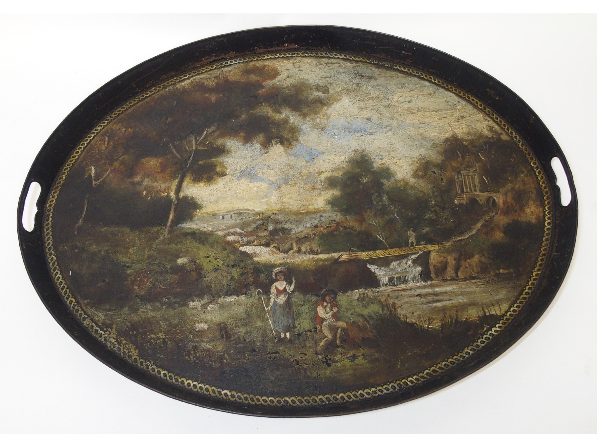 Appraisal: A Toleware two-handled tea traythe oval tray with children in