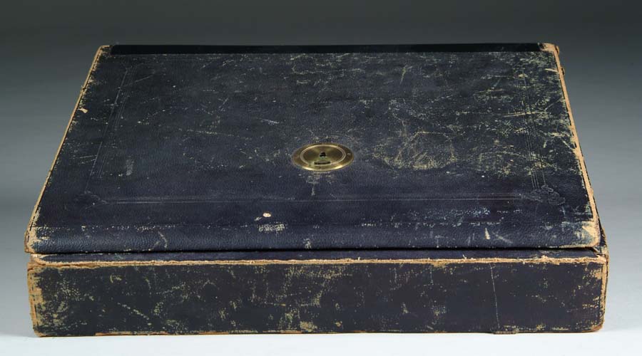 Appraisal: VERY EARLY PORTABLE WRITING DESK Leather covered wooden box long