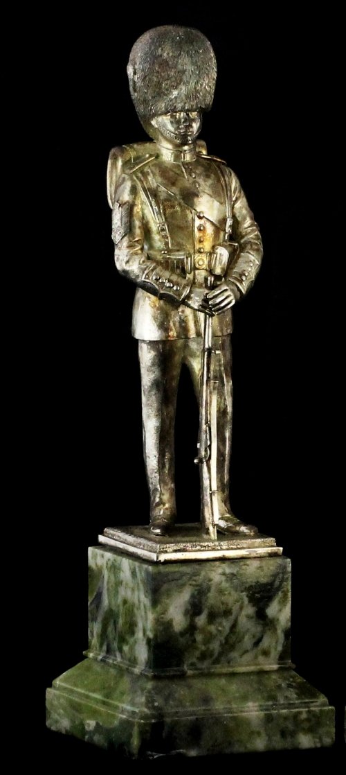 Appraisal: A Regimental silver model of an Irish Guardsman Carrington Co