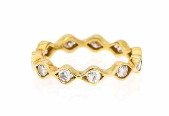 Appraisal: An Karat Yellow Gold and Diamond Eternity Band Ring containing