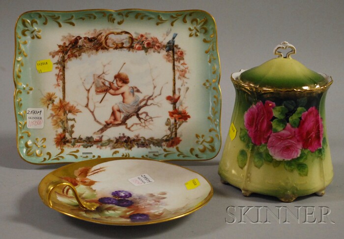 Appraisal: Three Decorated Porcelain Table Items an R Delinieres Co Limoges