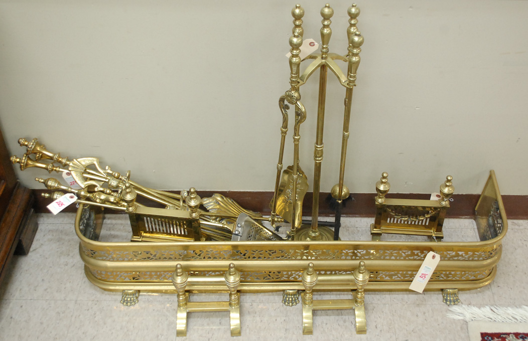 Appraisal: ANTIQUE BRASS FIREPLACE ACCESSORY COLLECTION total pieces including -piece tool