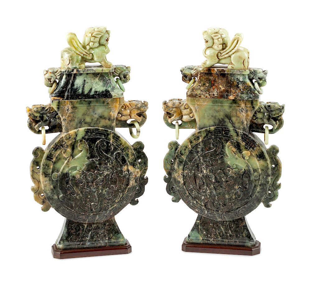 Appraisal: A Pair of Chinese Export Carved Hardstone Urns A Pair