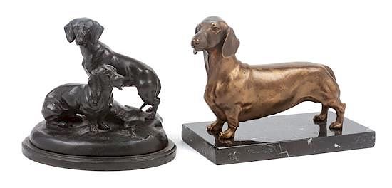 Appraisal: Two Dachshund Figures Width of wider base inches Two Dachshund