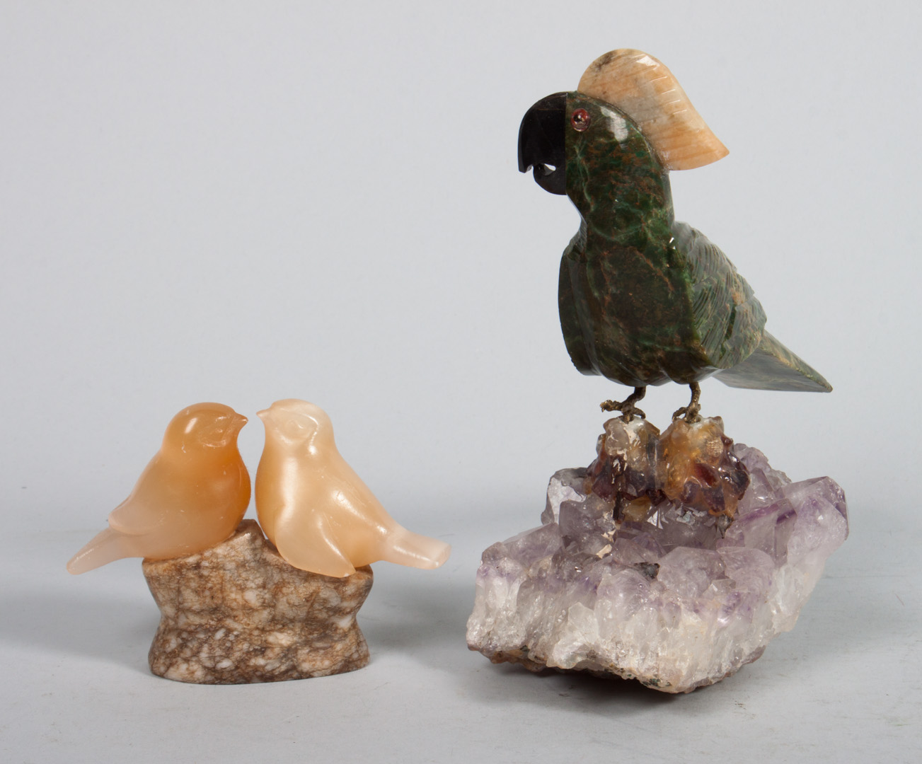 Appraisal: Continental carved hardstone cockatoo bird group cockatoo with carved green