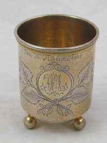 Appraisal: A Russian silver gilt three footed beaker with traditional engraved