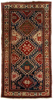 Appraisal: Kazak rug Three diamond central medallions on varying blue field