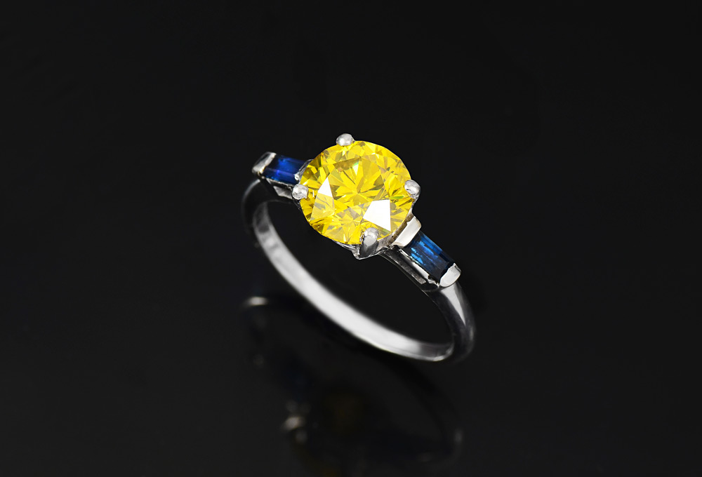 Appraisal: PLATINUM CT YELLOW DIAMOND SOLITAIRE RING Fancy intense yellow round