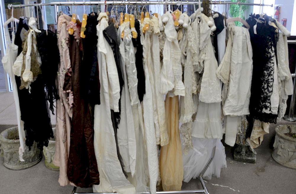 Appraisal: Rack of Victorian lace linens and embroidered clothes Rack of