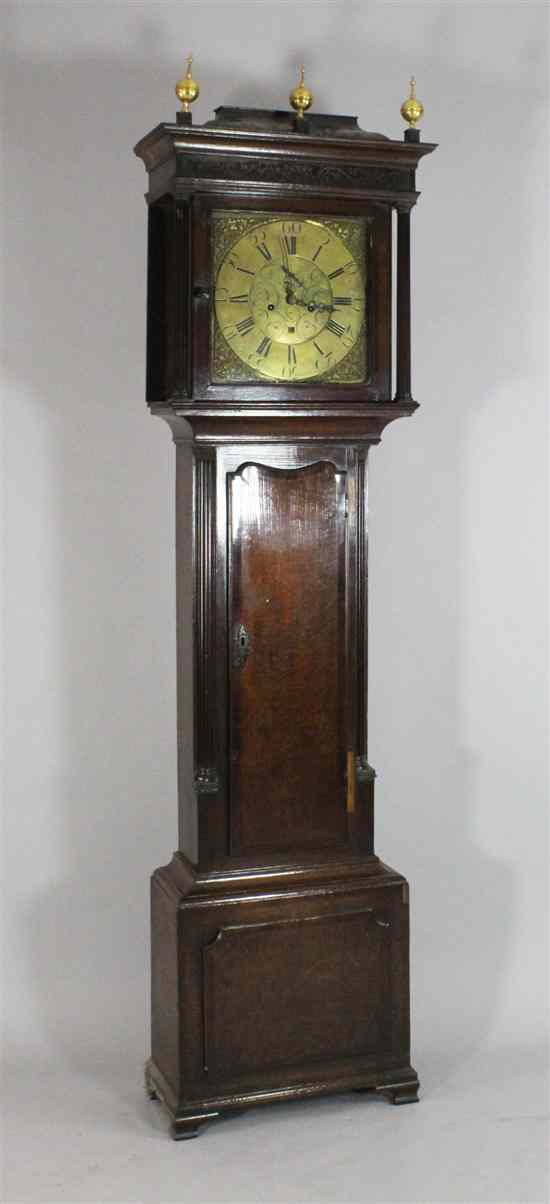 Appraisal: A George III mahogany banded oak eight day longcase clock