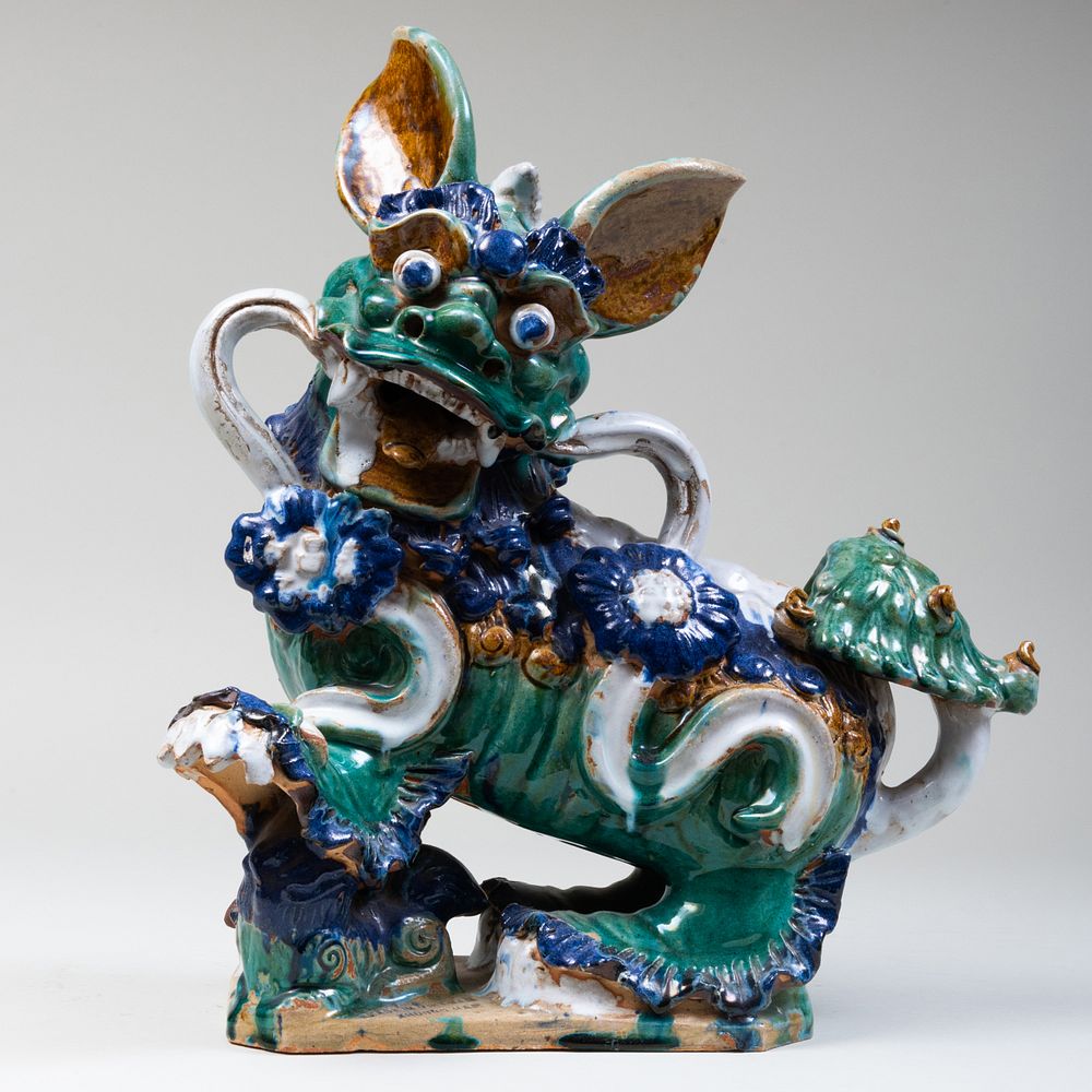 Appraisal: Vietnamese Glazed Pottery Figure of a Buddhistic Lion Impressed mark