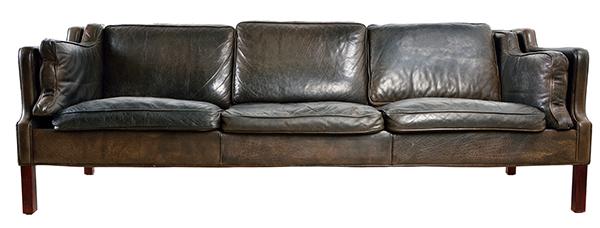 Appraisal: DANISH THREE SEATER SOFA c s black buffalo leather