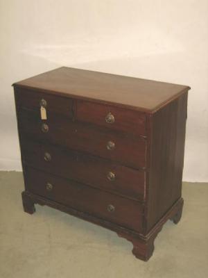 Appraisal: A MAHOGANY CHEST of two short over three long drawers