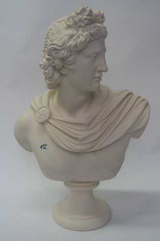 Appraisal: A FAUX MARBLE BUST OF APOLLO on pedestal base Height