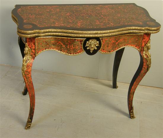 Appraisal: th century French boulle work serpentine card table with brass