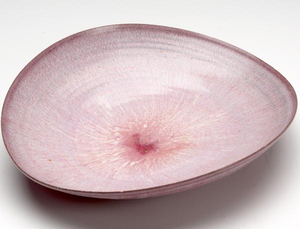 Appraisal: BEATRICE WOOD Large circular dish covered in mauve glaze Signed