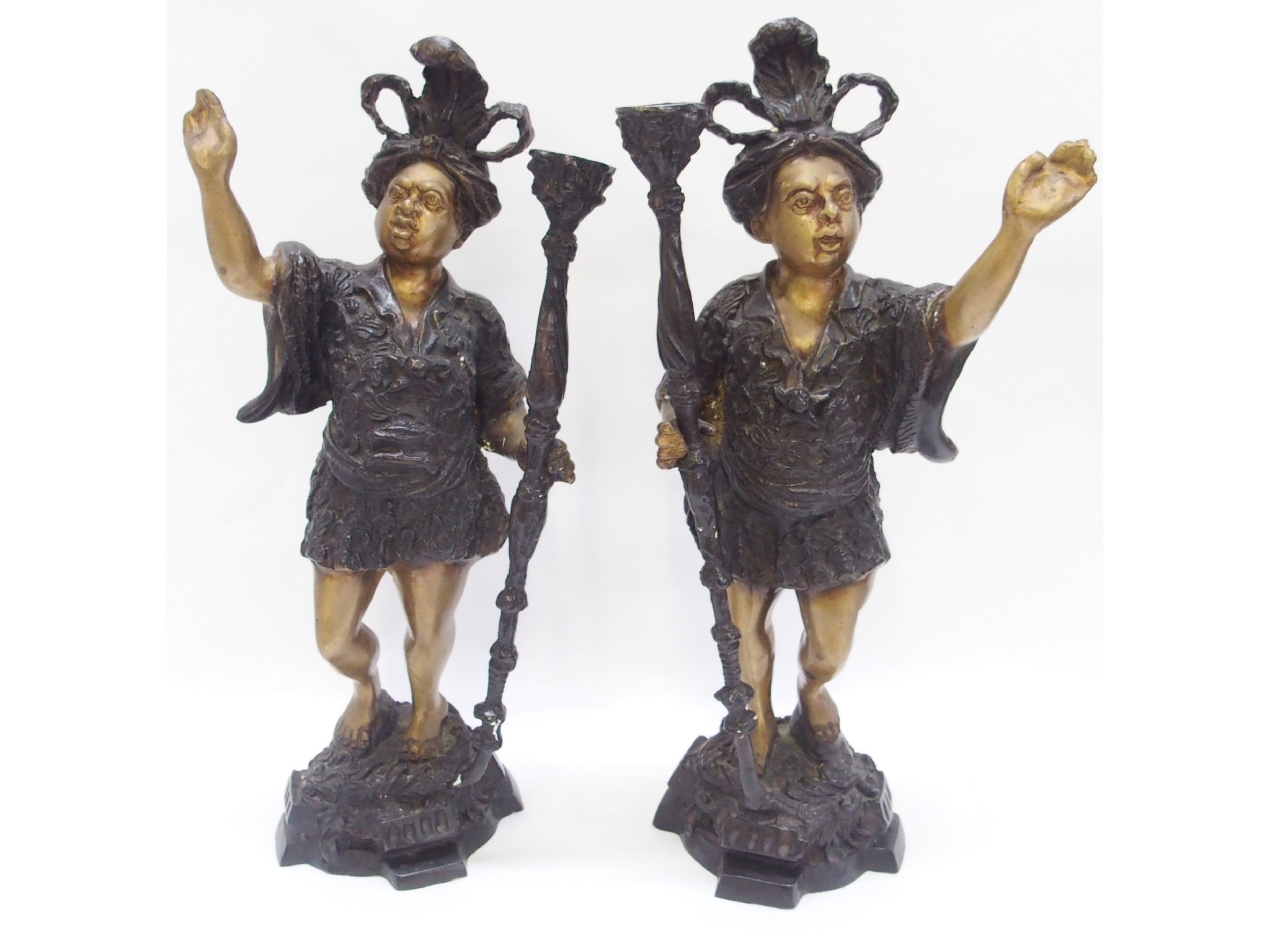 Appraisal: Pair of cast patinated metal figures