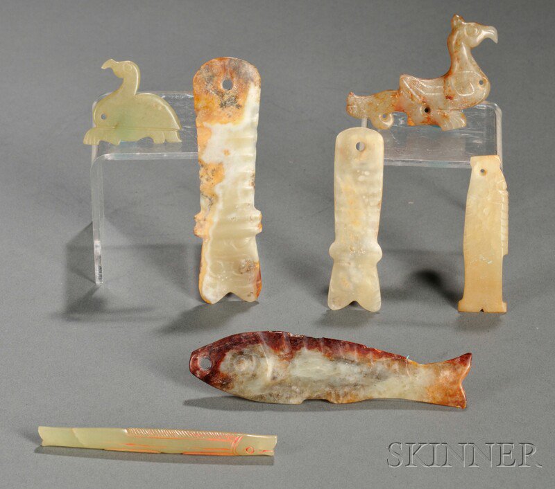 Appraisal: Seven Archaic-style Stone Pendants China two staff figures two birds