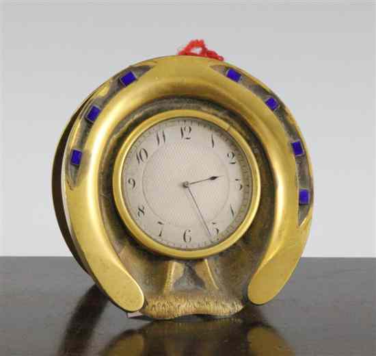 Appraisal: A Victorian blue enamel and ormolu desk timepiece modelled as