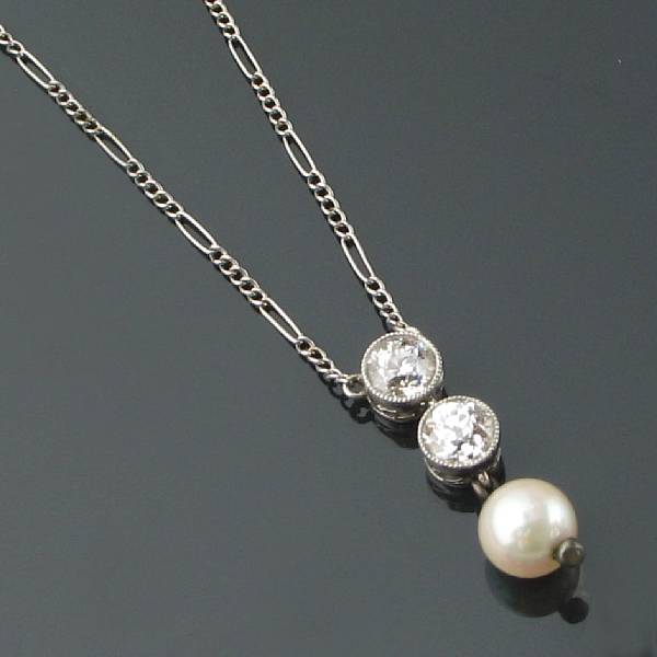 Appraisal: A two stone diamond cultured pearl and white gold necklace