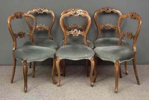 Appraisal: A set of six Victorian walnut balloon back occasional chairs