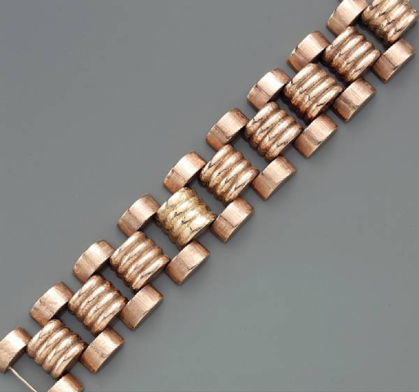 Appraisal: A rose gold link bracelet accented by one yellow gold