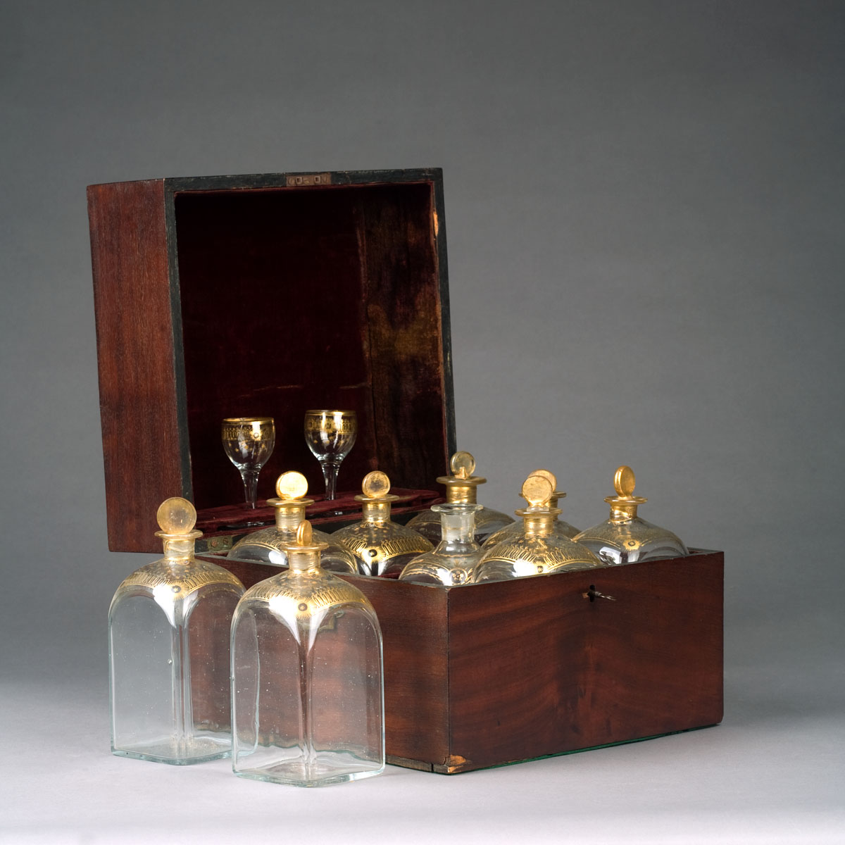 Appraisal: GEORGE III DECANTER SET HOUSED IN A FITTED MAHOGANY CASE