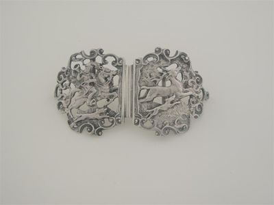 Appraisal: An Edwardian cast two-piece buckle with a stag hunting scene