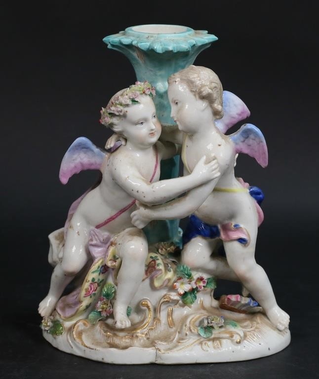 Appraisal: Meissen porcelain candlestick Cupid and Psyche Blue crossed swords mark