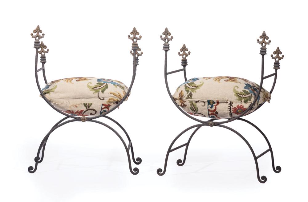 Appraisal: Pair of Continental Wrought Iron Curule Chairs fleur-de-lis finials incised