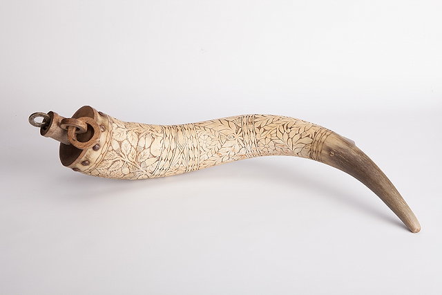 Appraisal: A HORN FLASK with carved oak tree and animal decoration