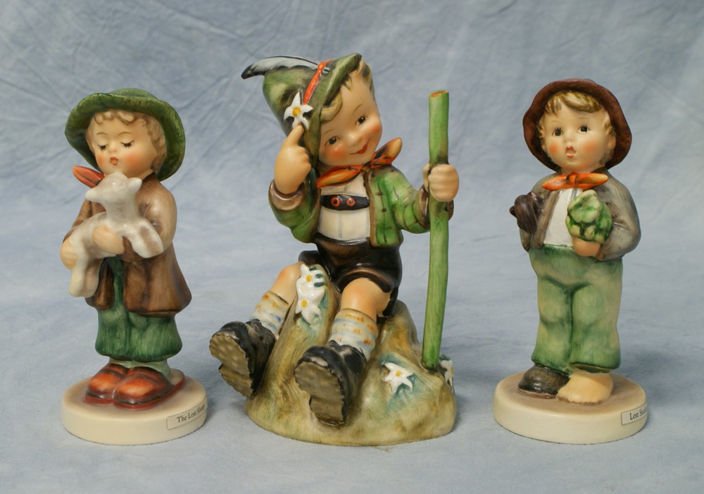 Appraisal: Goebel Hummel Figurines Lost Stocking some crazing No TMK- The