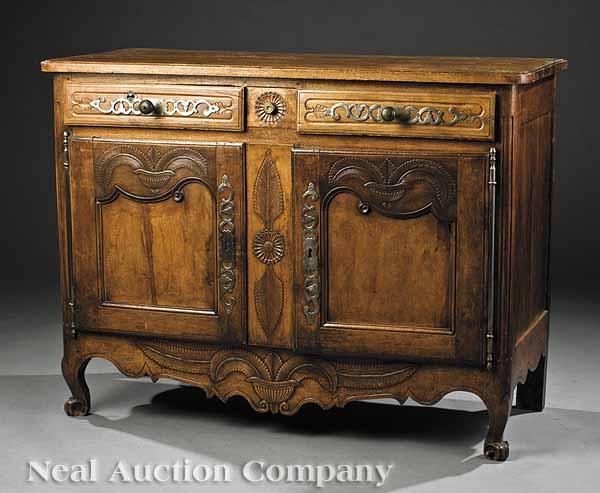 Appraisal: An Antique French Provincial Carved Cherrywood Buffet th c two